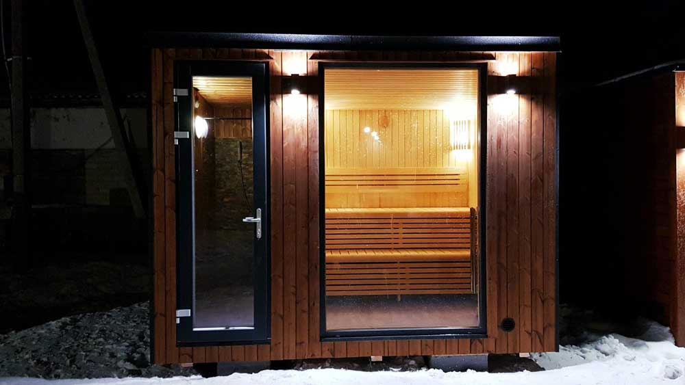 Loghouse’s-new-sauna-garden-room---Exterior-at-night